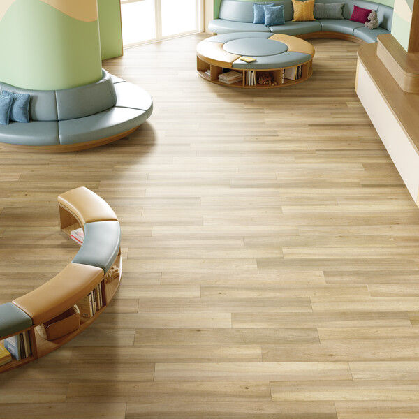 Room scene with modern seating and wook-look LVT flooring