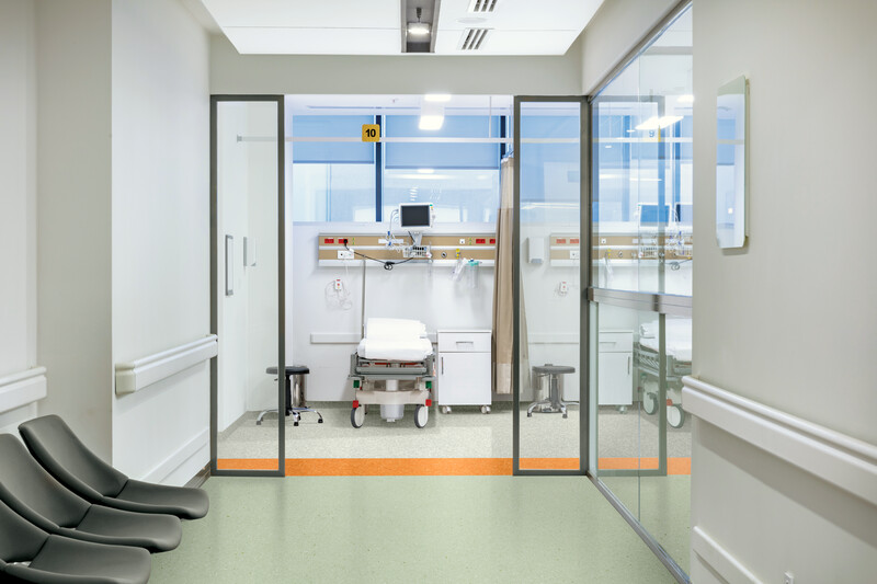 Examination room in a hospital where homogeneous and heterogenous flooring provide durability and germ protection 