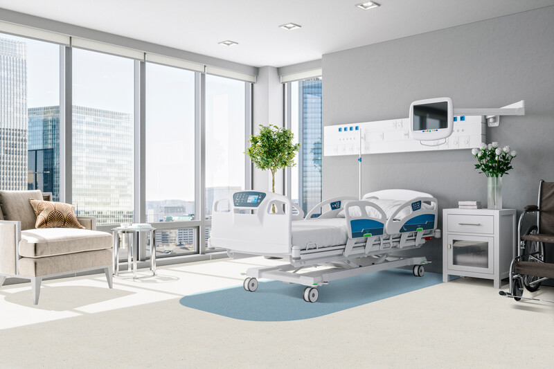 Patient room in a hospital with sheet vinyl flooring that