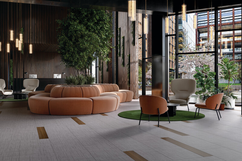 Seating area in a lobby with LVT flooring