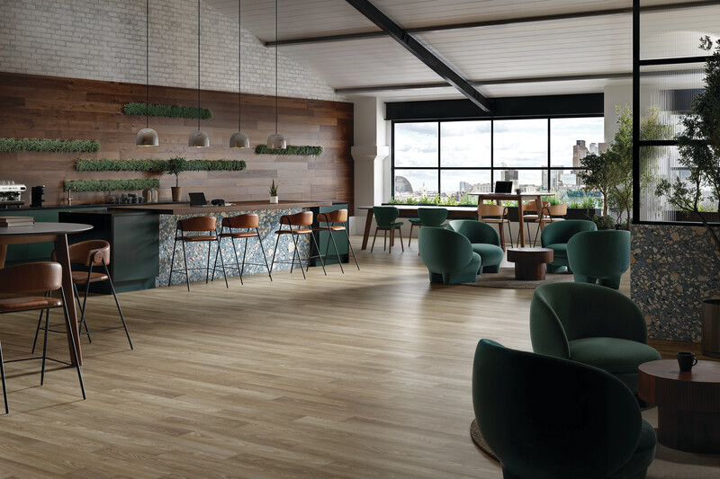 Dining area with a bar and wood-look LVT